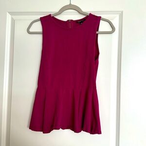 TOPSHOP sleeveless magenta peplum blouse (SIZE 8)